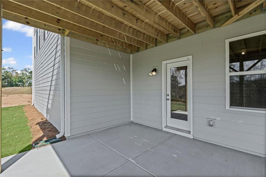Exterior details and patio area of a home in Twin Lakes, Hoschton (Image 27).