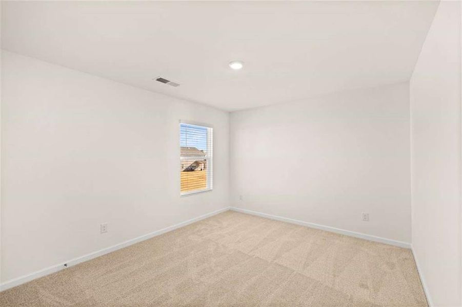 Spacious, unfurnished interior of a new home in Preserve at Dove Creek, Statham (Image 18).