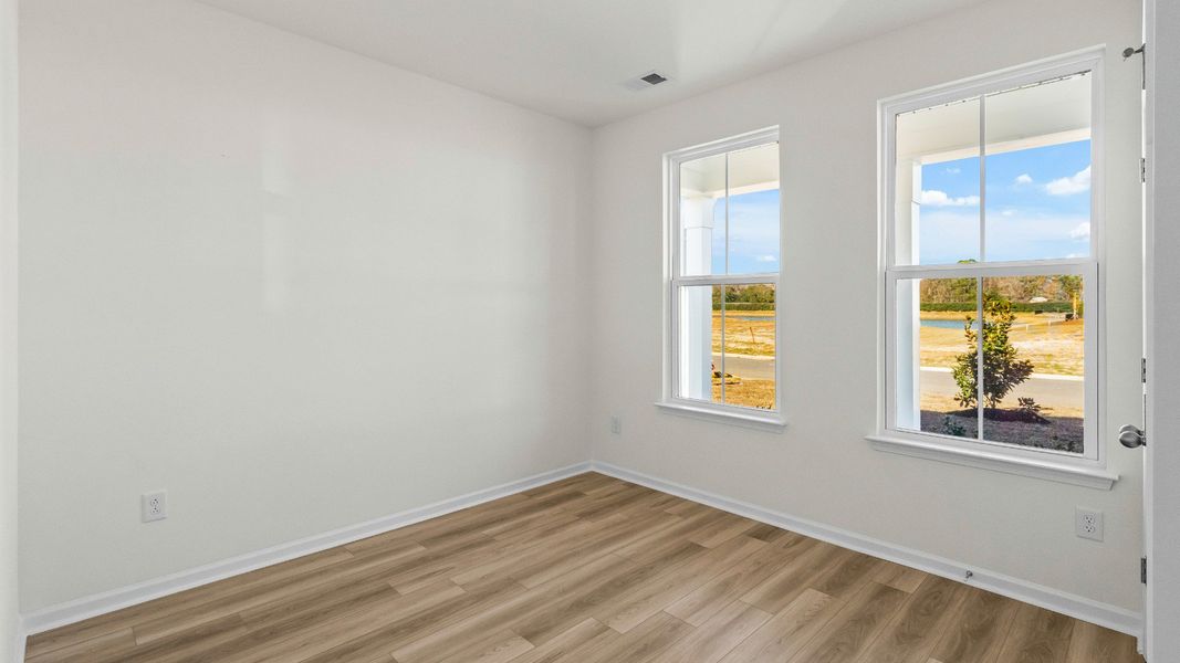 Comfortable secondary bedroom ideal for guests, work, or play Comfortable secondary bedroom ideal for guests, work, or play