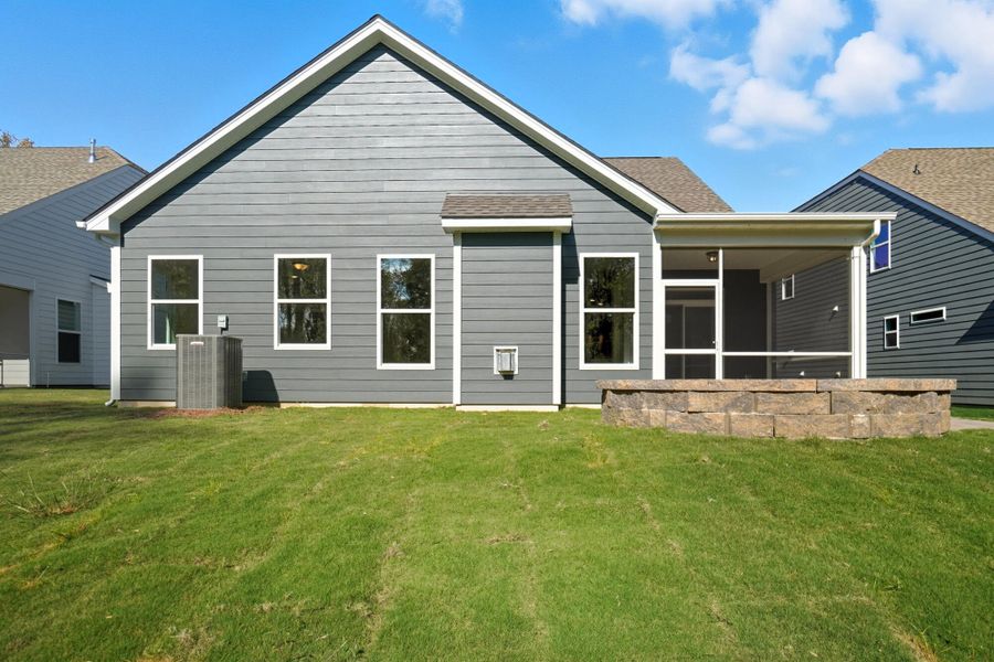 Exterior details and patio area of a home in Heritage - 55+ Community, Wesley Chapel (Image 24).