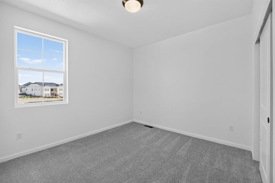 Spacious, unfurnished interior of a new home in Macanta, Castle Rock (Image 22).