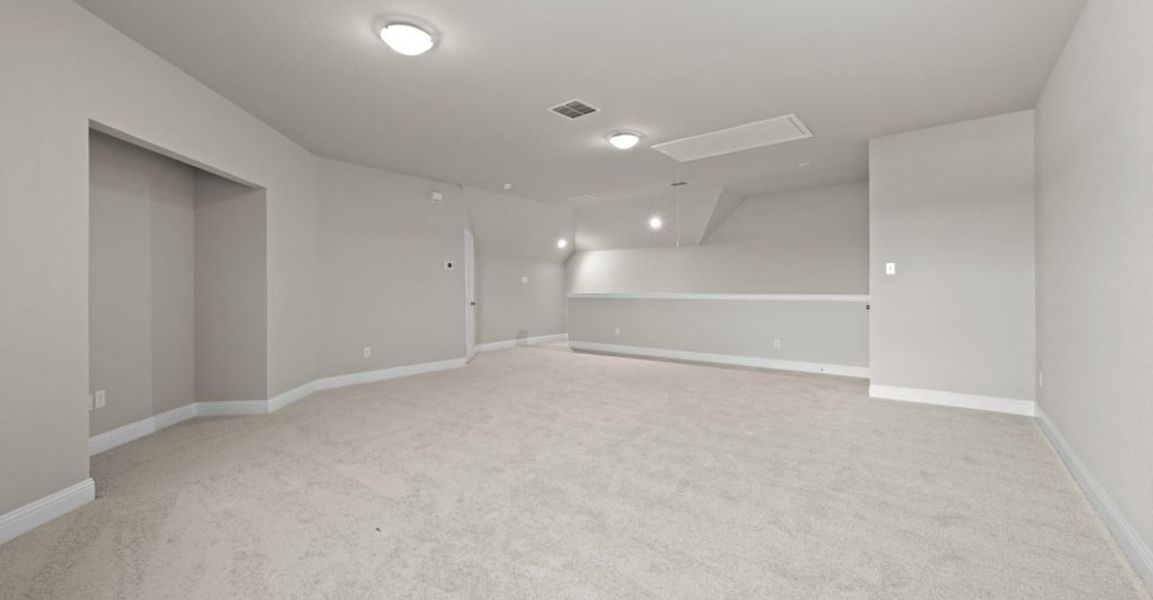 Representative exterior photo of a completed home built from the Donnington by Impression Homes in Still Water Lake, Godley, TX (Image 10).