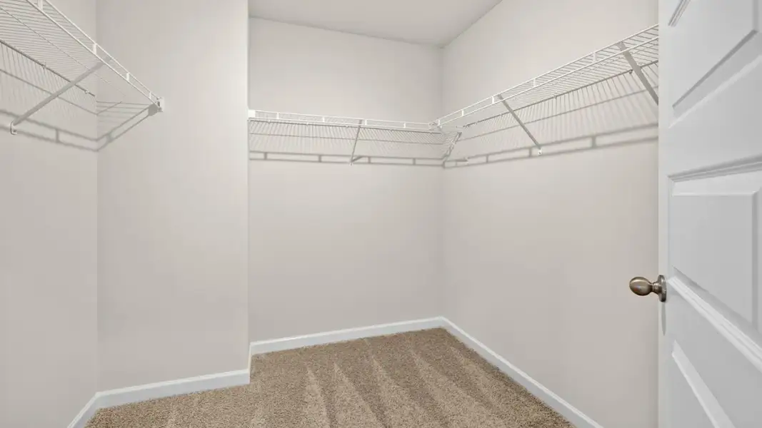 Representative unfurnished interior of a home built from the Saratoga by D.R. Horton in Branford Crossing, Stockbridge (Image 20).