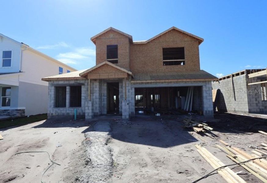 In-progress construction of a new home in Waterset Classic Series, Apollo Beach, FL (Image 7).