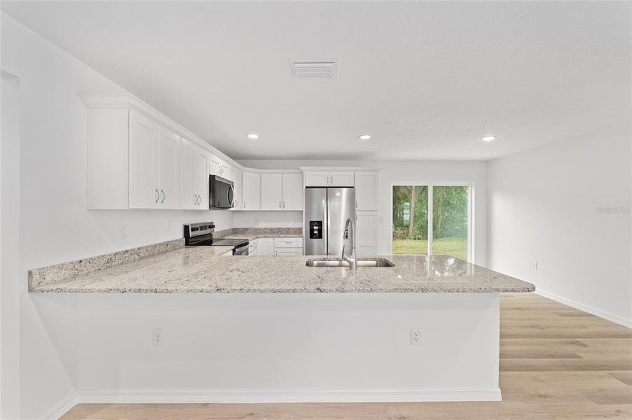 Furnished interior view inside a new home in , Ocklawaha (Image 7).