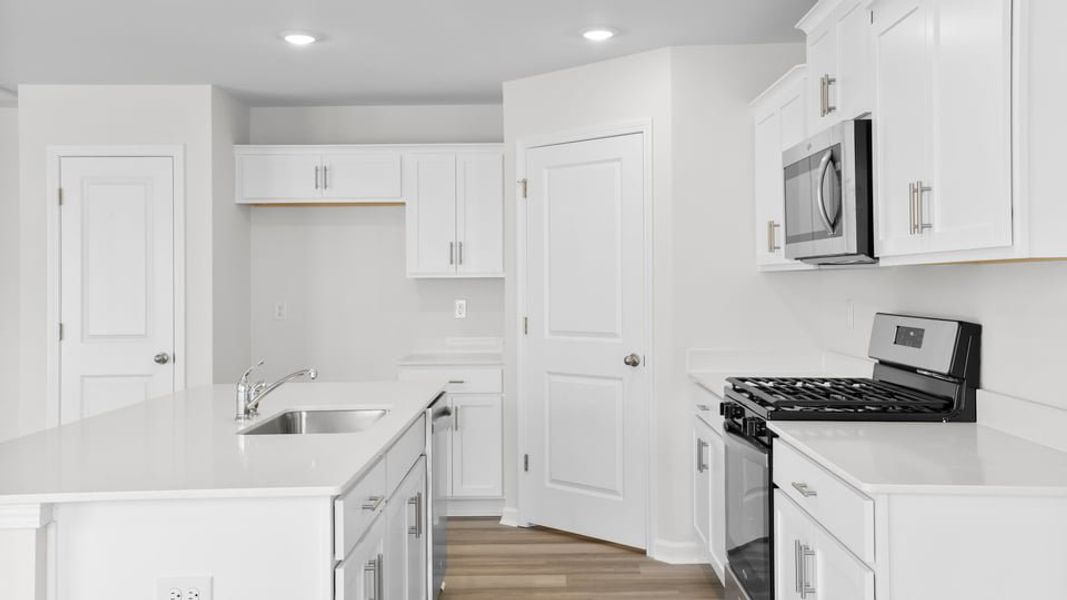 Furnished interior view inside a new home in Village Grove, Greenville (Image 9).