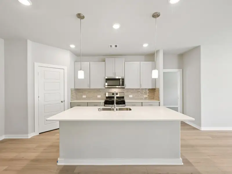 Furnished interior view inside a new home in Pine Lake Cove - Premier Series, Montgomery (Image 4).