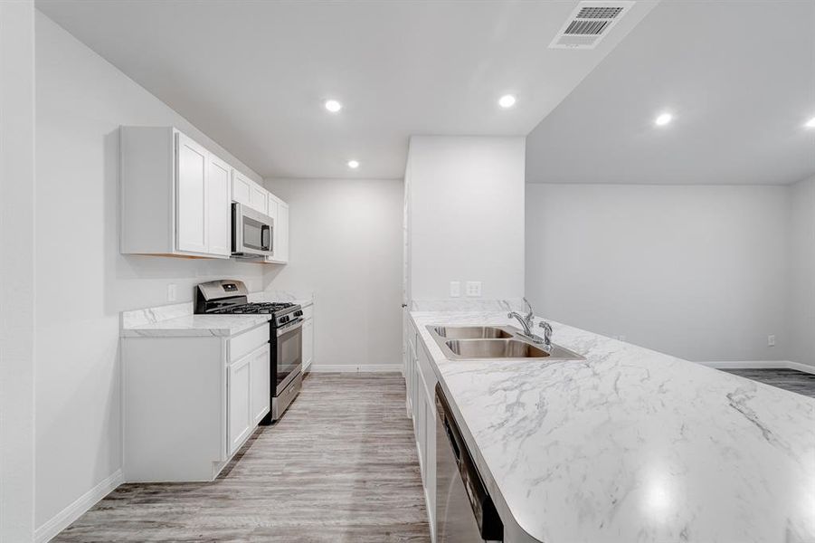 Furnished interior view inside a new home in Park Central, Mineola (Image 9).