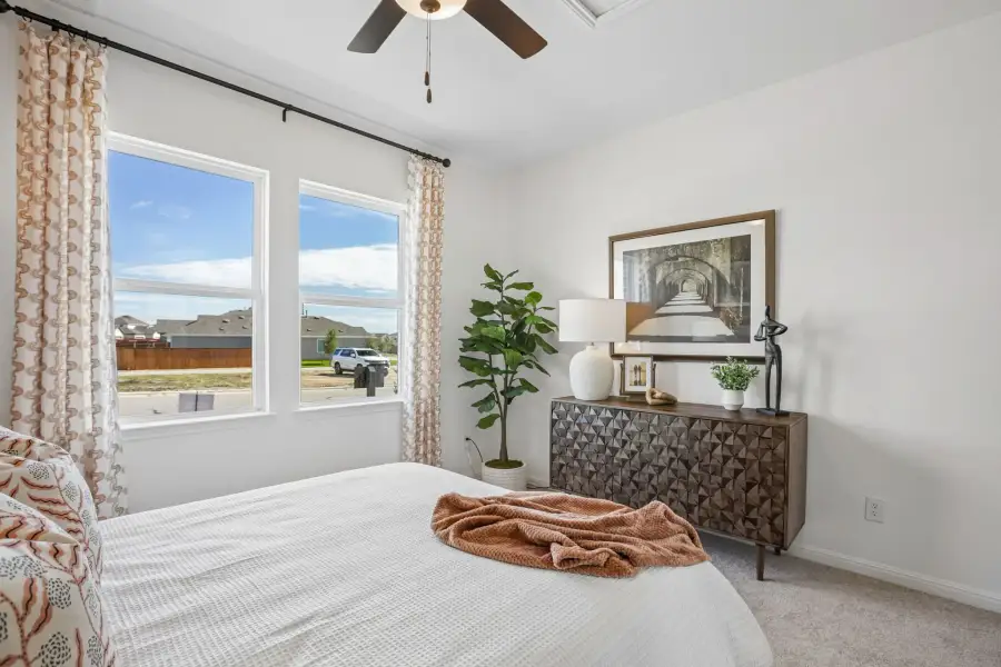 Representative furnished interior of a home built from the Sparrow by Taylor Morrison in Longview, Del Valle (Image 31).