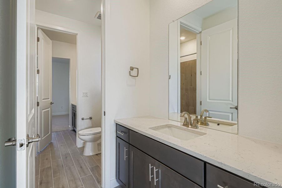 Furnished interior view inside a new home in Red Rocks Ranch: The Grand Collection, Morrison (Image 6).