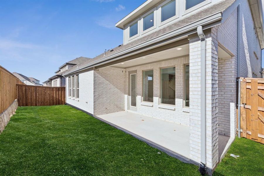 Dining al fresco is in your future on this lovely covered back patio with private fenced yard! Dining al fresco is in your future on this lovely covered back patio with private fenced yard!
