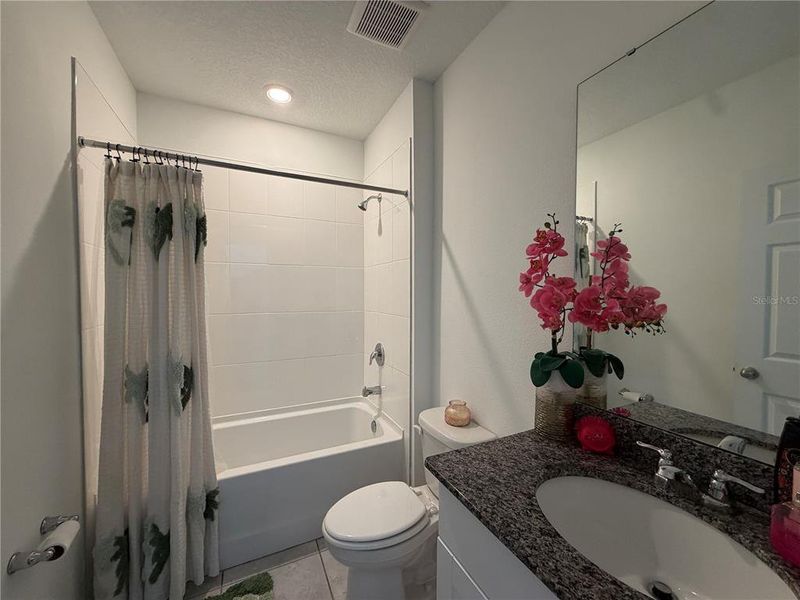 Furnished interior view inside a new home in Lake Deer Estates - Signature Series, Poinciana (Image 9).