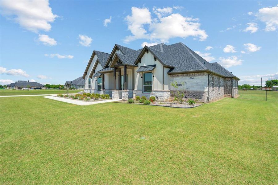 Side View of Home and Spacious Frontyard