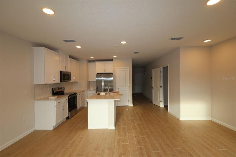Furnished interior view inside a new home in Reeves Place, Orlando (Image 5).