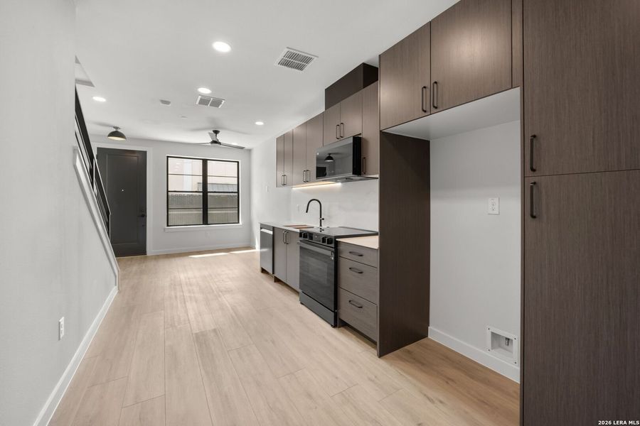 Furnished interior view inside a new home in , New Braunfels (Image 9).