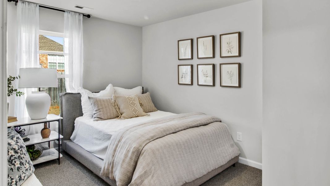 Representative furnished interior of a home built from the Freeport by D.R. Horton in Bailey Park, Fayetteville (Image 9).