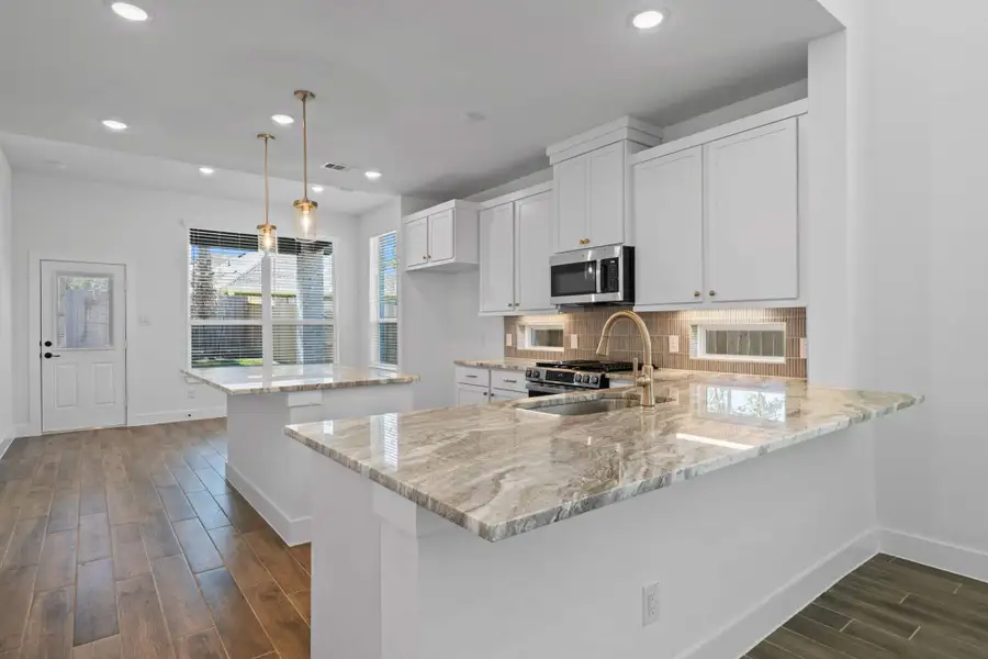 Furnished interior view inside a new home in The Woodlands Hills, Willis (Image 5). Furnished interior view inside a new home in The Woodlands Hills, Willis (Image 5).