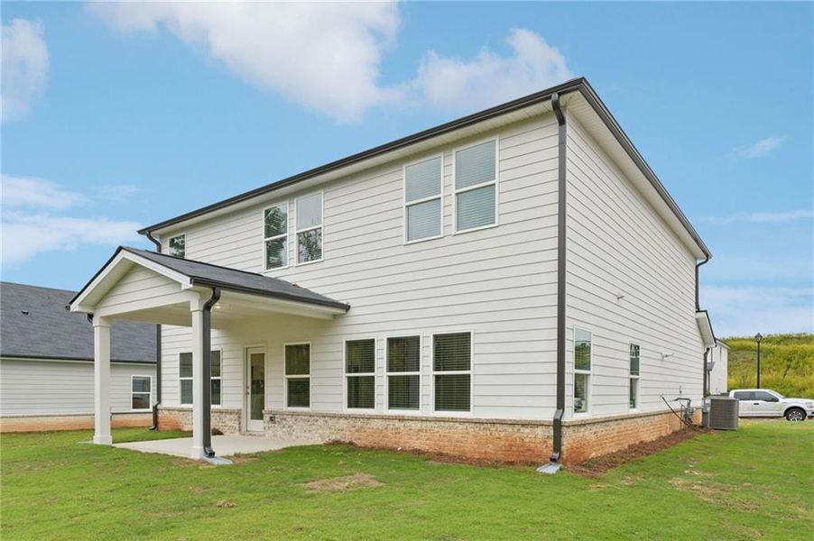 Exterior details and patio area of a home in Preserve at Mountain Creek, Pendergrass (Image 3).