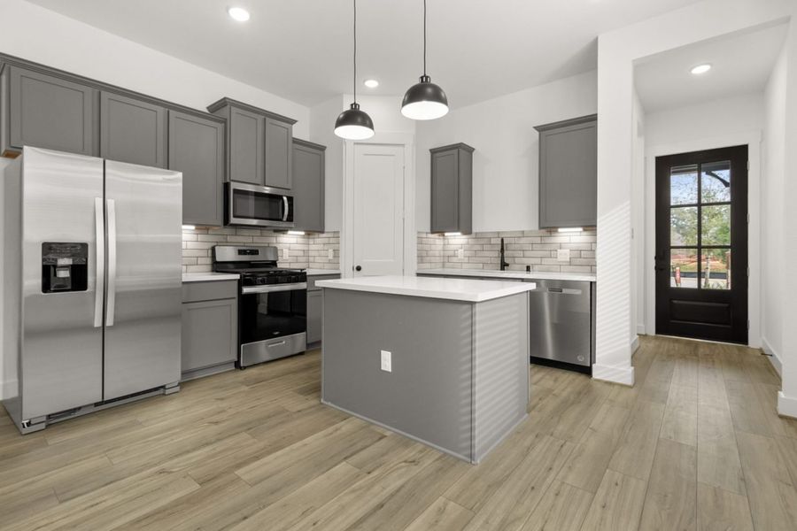 Representative furnished interior of a home built from the Caddo II Sorella 40s by Brohn Homes in Sorella, Tomball (Image 4).