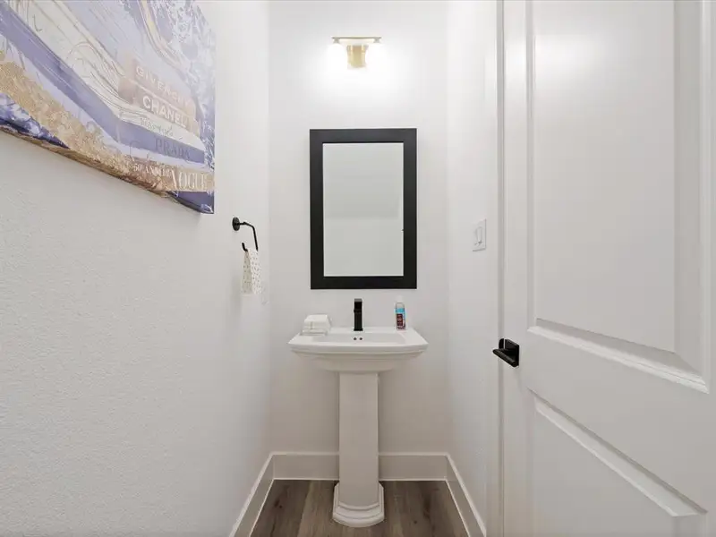 Furnished interior view inside a new home in Royal Court, Little Elm (Image 10).