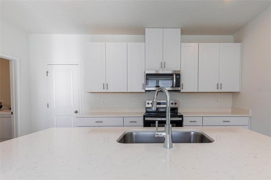 Furnished interior view inside a new home in Flagler Village - Classic Series, Palm Coast (Image 9).