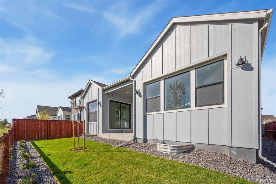 Exterior details and patio area of a home in Festival at RainDance, Windsor (Image 2). Exterior details and patio area of a home in Festival at RainDance, Windsor (Image 2).