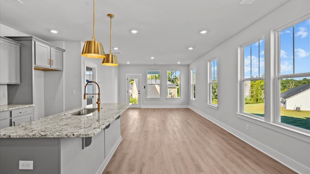 Notable 7-foot island provides generous prep and gathering space in this thoughtfully designed kitchen