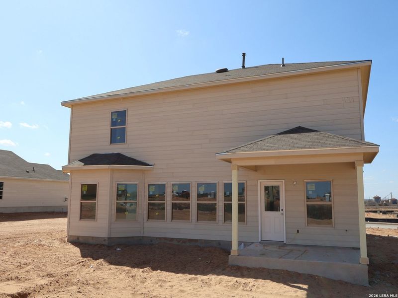 Exterior details and patio area of a home in Hickory Ridge, Elmendorf (Image 3).