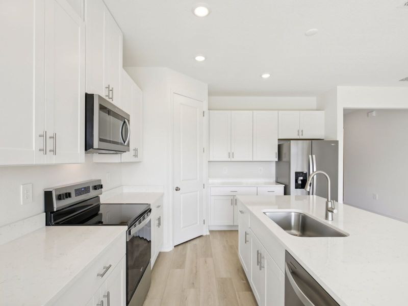 Furnished interior view inside a new home in Coasterra - Reserve Series, Palmetto (Image 7).