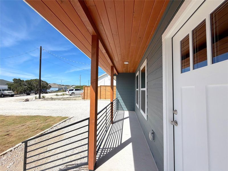 Exterior details and patio area of a home in , Spring Branch (Image 26).