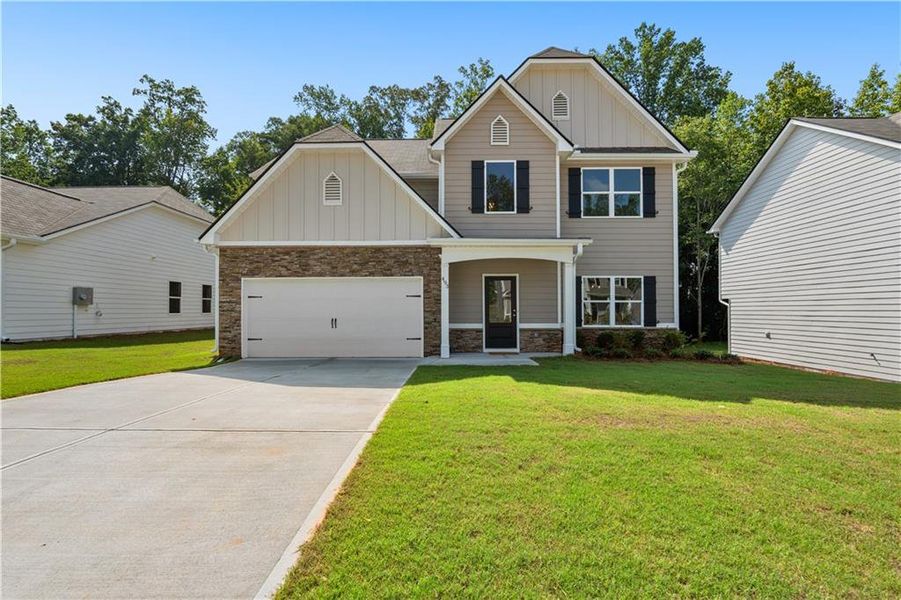Front exterior of a new home in , Villa Rica, GA, highlighting curb appeal (Image 2).