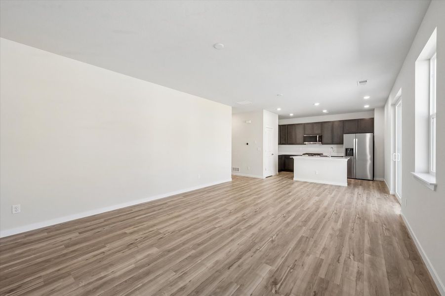 A room with wood floors.