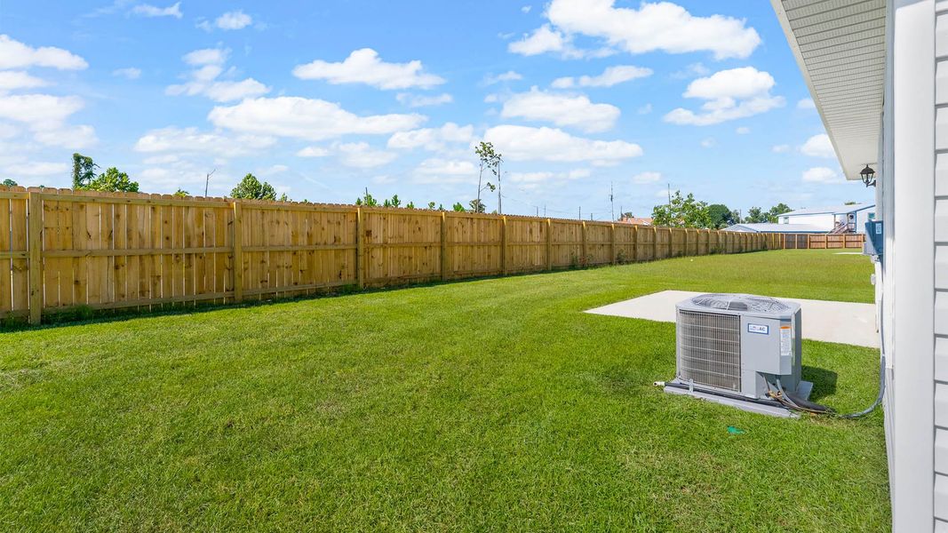 Front exterior of a new home in Park Place, Panama City, FL, highlighting curb appeal (Image 20). Front exterior of a new home in Park Place, Panama City, FL, highlighting curb appeal (Image 20).