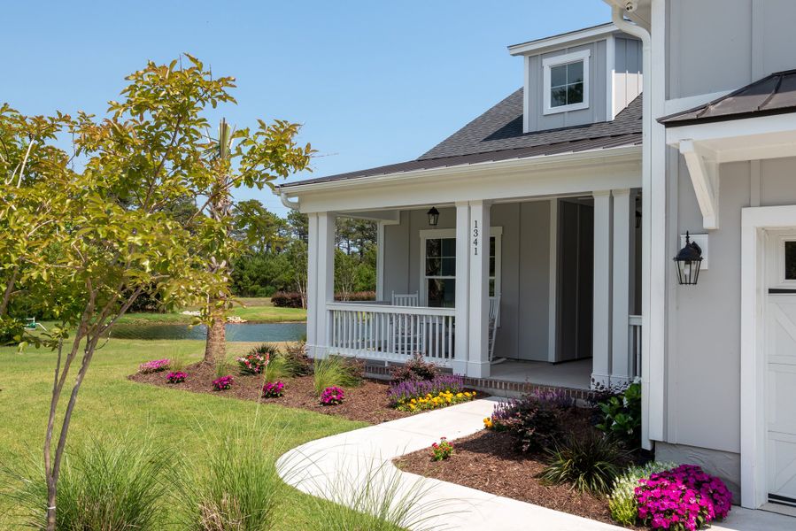 Representative exterior photo of a completed home built from the Ashton by Bill Clark Homes in Osprey Landing, Southport, NC (Image 28). Representative exterior photo of a completed home built from the Ashton by Bill Clark Homes in Osprey Landing, Southport, NC (Image 28).