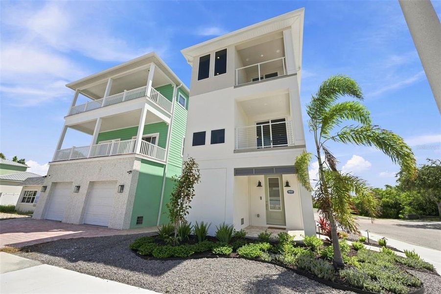Front exterior of a new home in , Indian Rocks Beach, FL, highlighting curb appeal (Image 30). Front exterior of a new home in , Indian Rocks Beach, FL, highlighting curb appeal (Image 30).