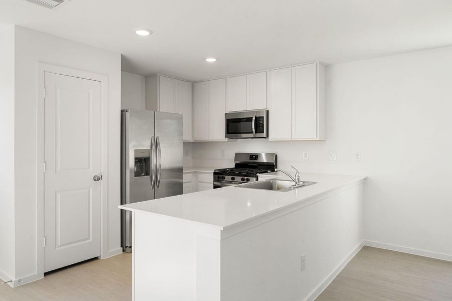 Furnished interior view inside a new home in Emberly: Cottage Collection, Beasley (Image 19).