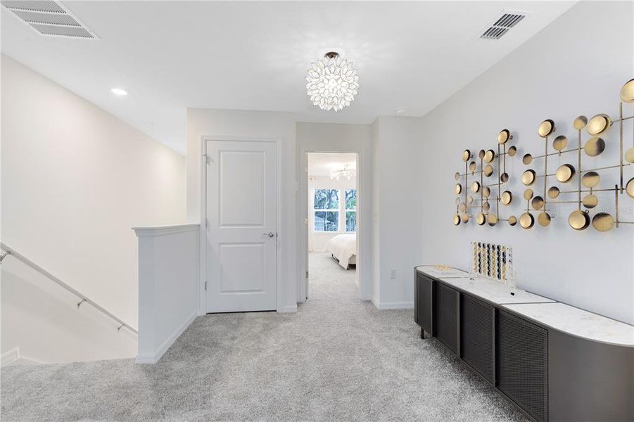 Furnished interior view inside a new home in The Cove at Nona Sound, Orlando (Image 20). Furnished interior view inside a new home in The Cove at Nona Sound, Orlando (Image 20).