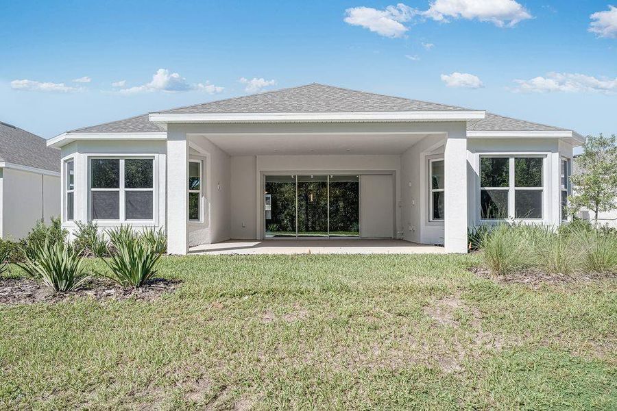 Exterior details and patio area of a home in Esplanade at Center Lake Ranch, St. Cloud (Image 2).