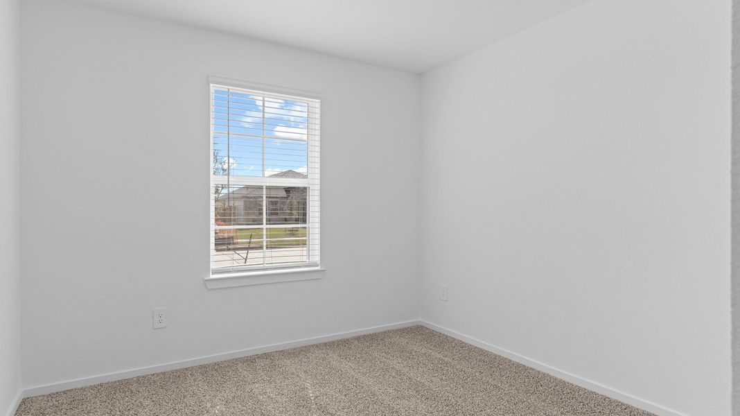 Spacious, unfurnished interior of a new home in Caldwell Crossing, Iowa Colony (Image 17).
