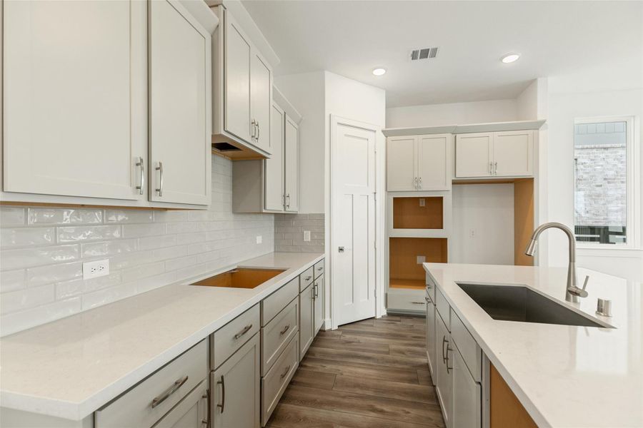 Furnished interior view inside a new home in Bridgeland Central, Cypress (Image 12).