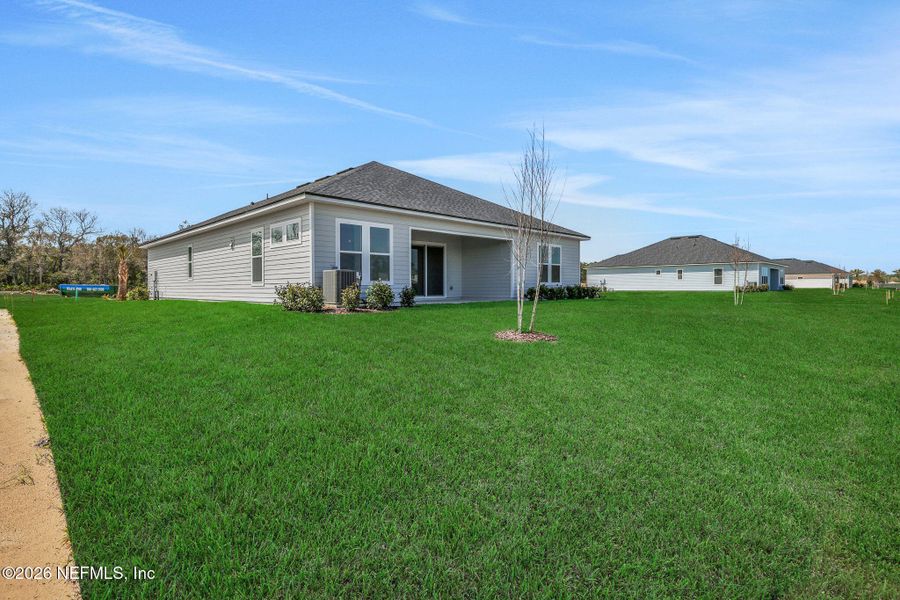 Exterior details and patio area of a home in Veranda Bay, Flagler Beach (Image 24).