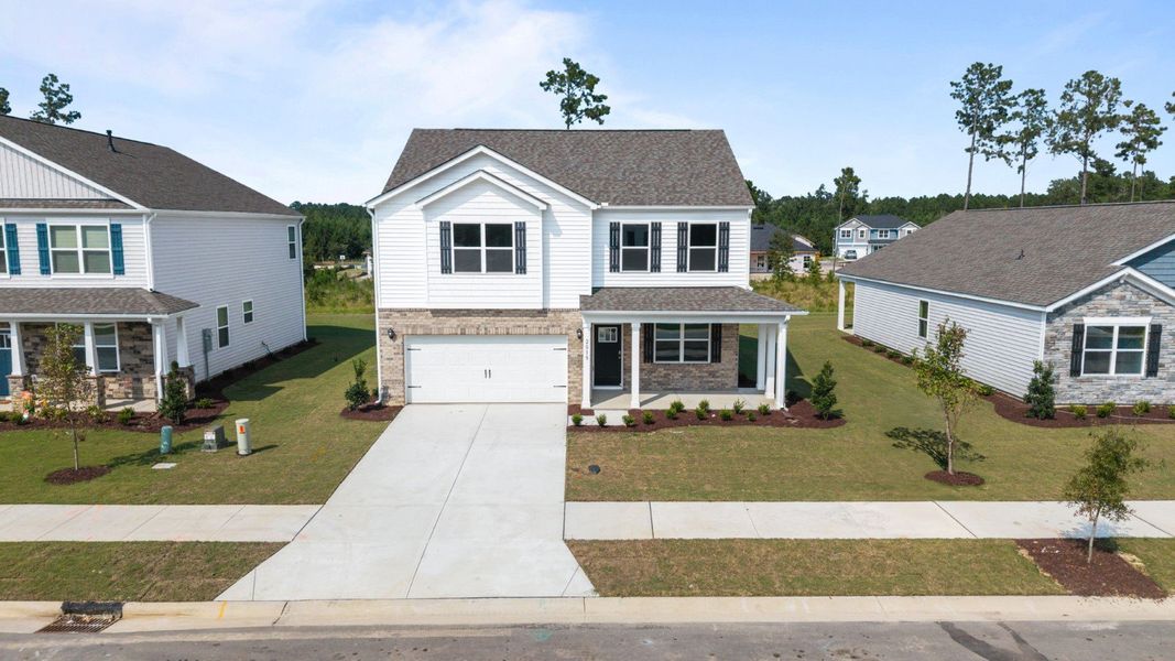 Front exterior of a new home in West New Bern, New Bern, NC, highlighting curb appeal (Image 2).
