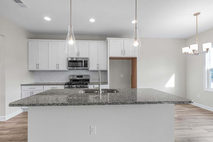 Representative furnished interior of a home built from the Clayton by Caviness & Cates Communities in Bartlett Manor, Youngsville (Image 166).