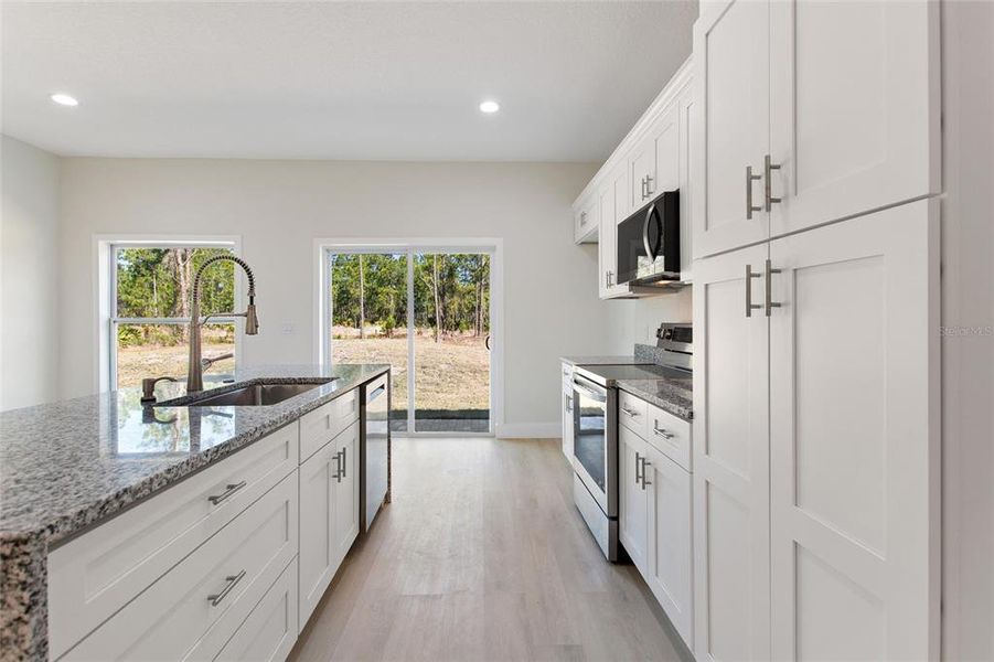 Furnished interior view inside a new home in , Indian Lake Estates (Image 12).
