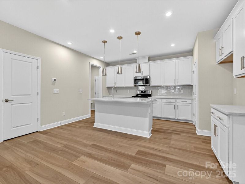 Anchoring the Home, the Kitchen Pulls Attention.