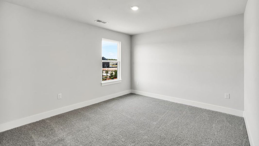 Spacious, unfurnished interior of a new home in Sidbury Station, Castle Hayne (Image 30).