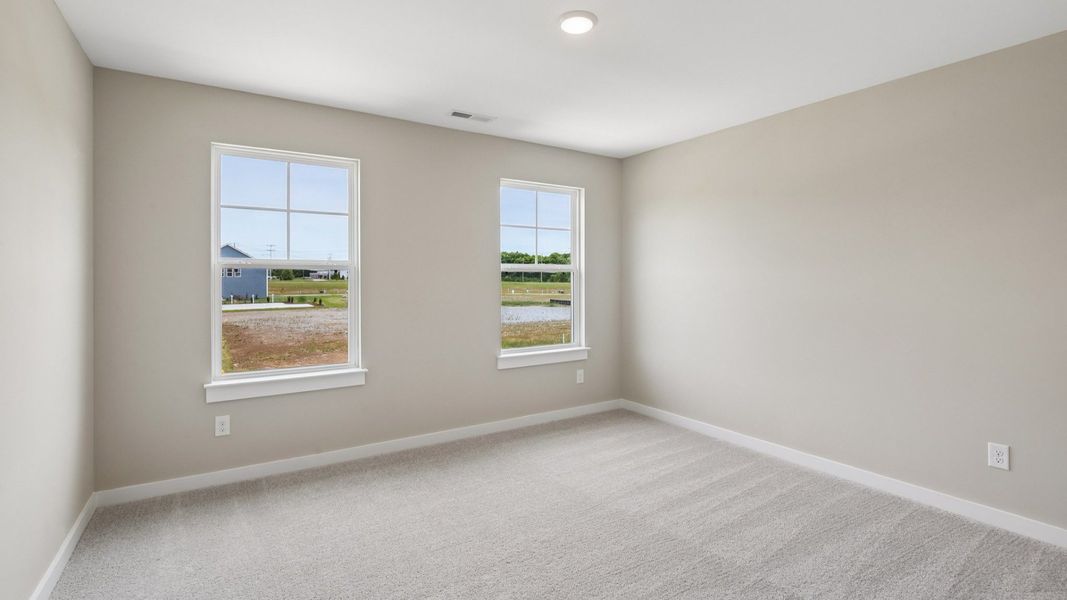 Secondary Bedroom with two windows Secondary Bedroom with two windows