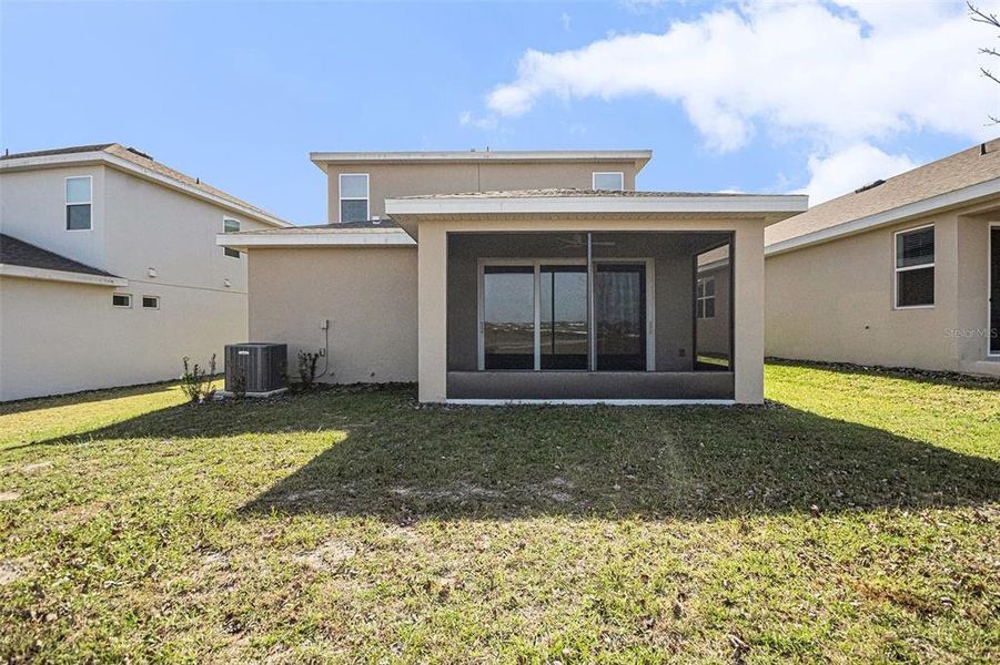 Exterior details and patio area of a home in Hills of Minneola, Minneola (Image 27).