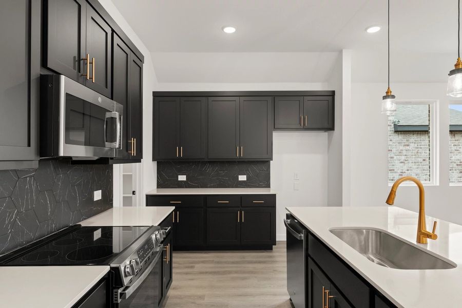 Kitchen featuring the Noir Collection
