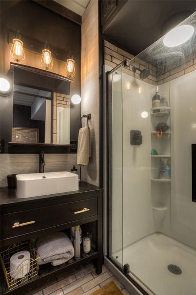 Downstairs bath off bedroom.